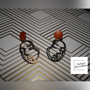 Dope double faced earrings!! #TPBC